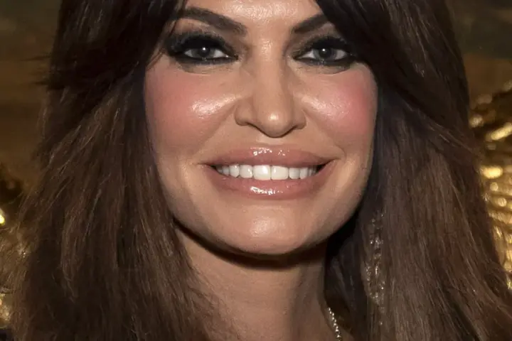Cropped photograph of political figure and US Ambassador to Greece Kimberly Guilfoyle at a public gathering.