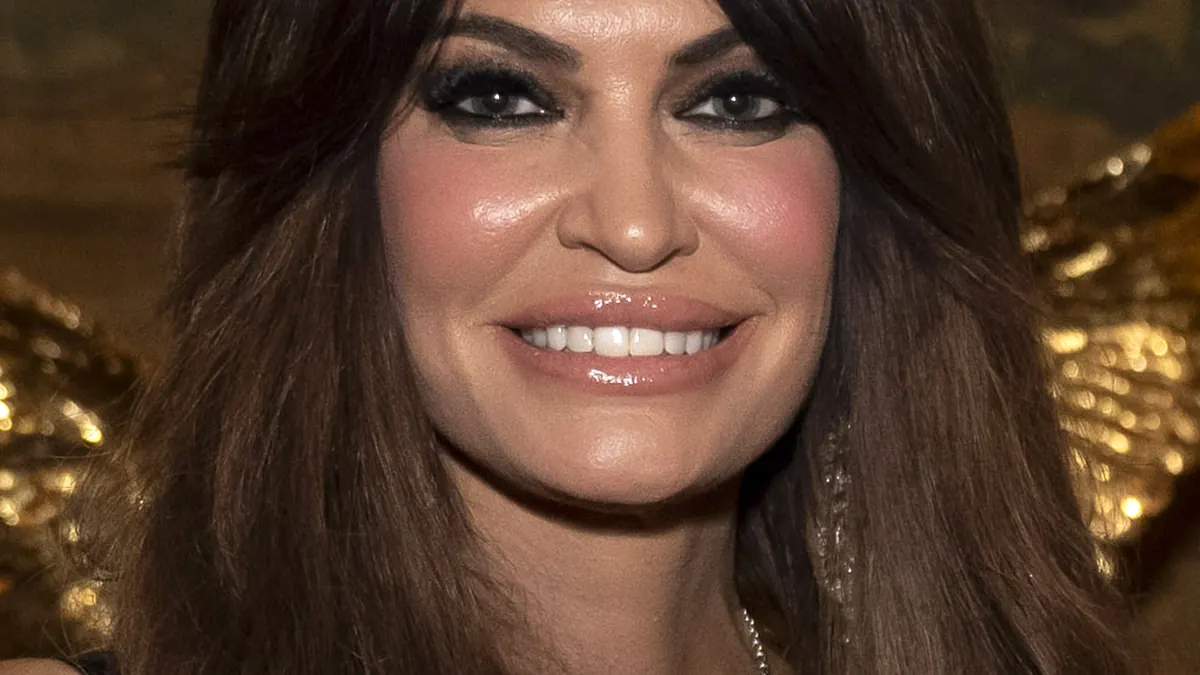 Cropped photograph of political figure and US Ambassador to Greece Kimberly Guilfoyle at a public gathering.