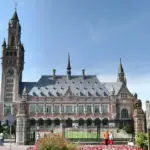 Exterior view of the historic Peace Palace courthouse building in The Hague, Netherlands.