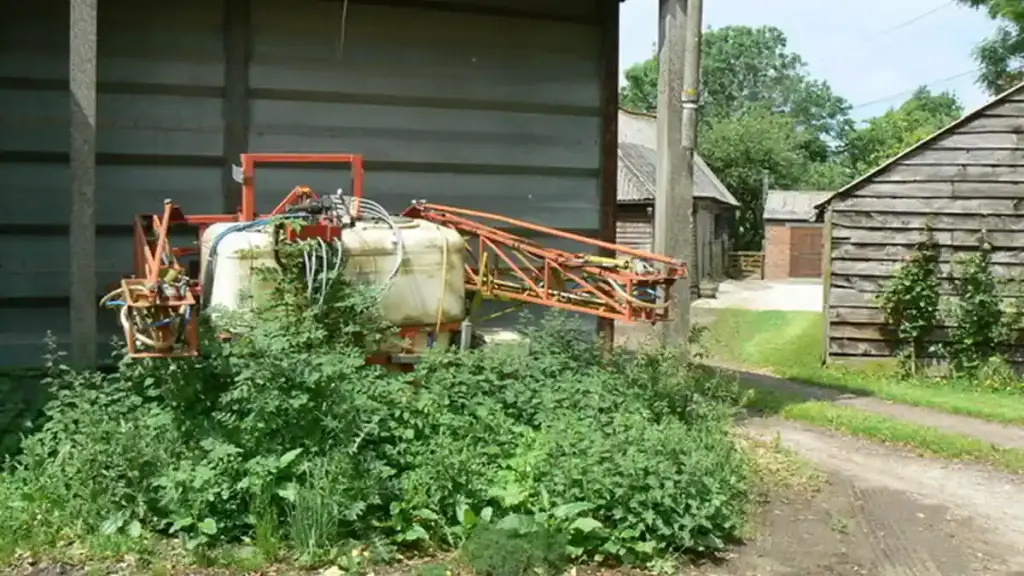 A crop sprayer in an agricultural field
