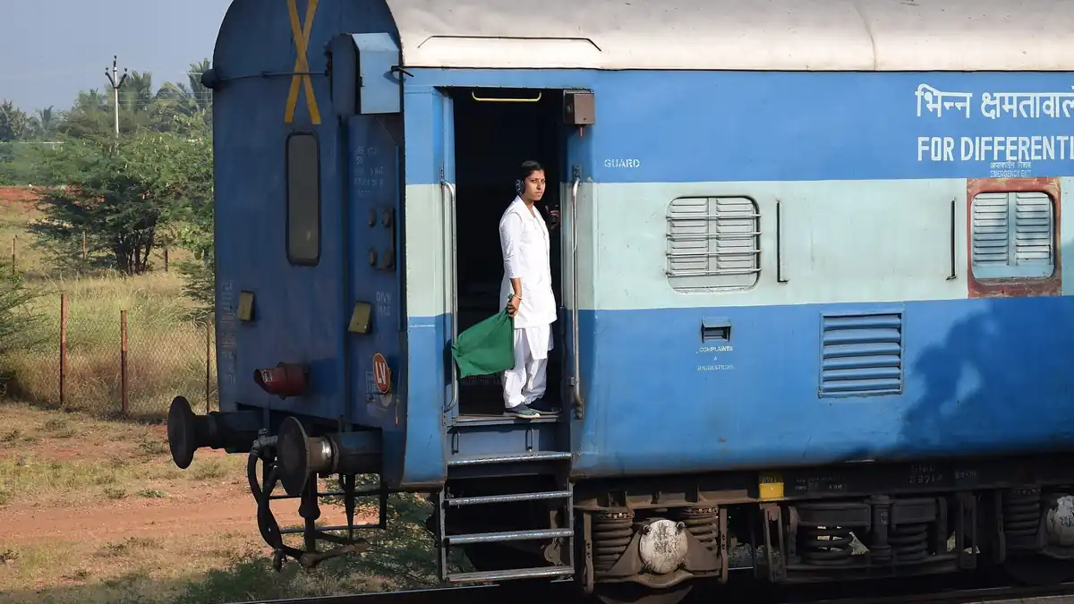 An Indian Railways woman guard.jpg