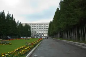 Exterior of a research building among pine trees in Siberia