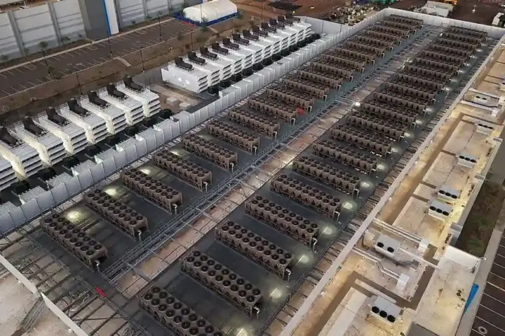 Cooling equipment beside a large data centre building