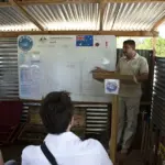 Mine-action coordinator briefs visitors in Sri Lanka.