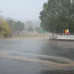 Floodwater covering a road intersection in Queensland