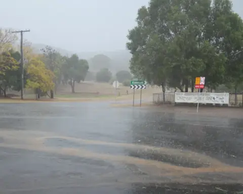 Floodwater covering a road intersection in Queensland