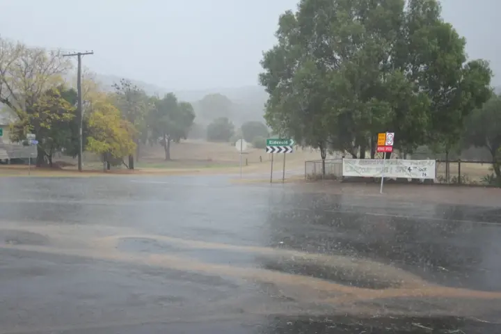 Floodwater covering a road intersection in Queensland