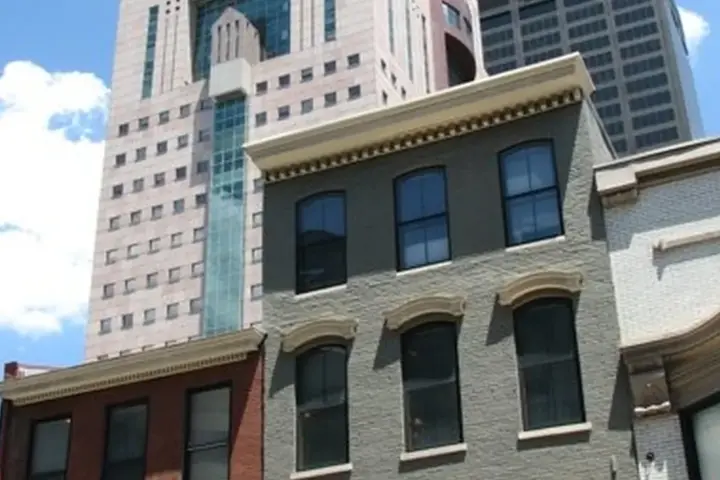 Exterior street perspective of the Michael Graves-designed Humana Building corporate headquarters in downtown Louisville, Kentucky.