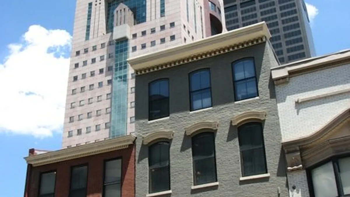 Exterior street perspective of the Michael Graves-designed Humana Building corporate headquarters in downtown Louisville, Kentucky.