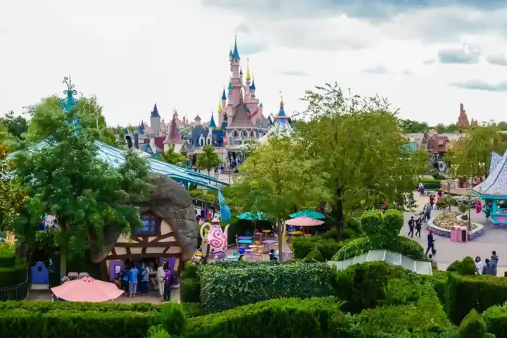 Wide view of Disneyland Paris attractions and landscaped grounds