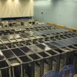 Long rows of server racks inside a data center hall.