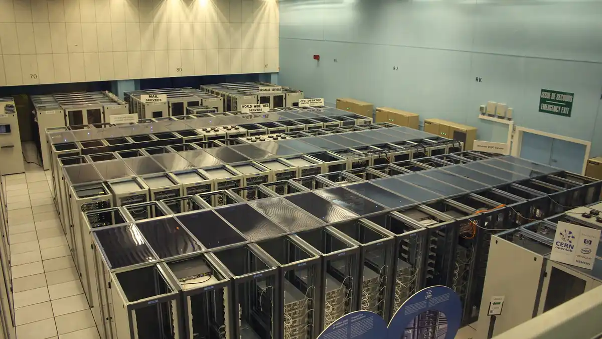 Long rows of server racks inside a data center hall.