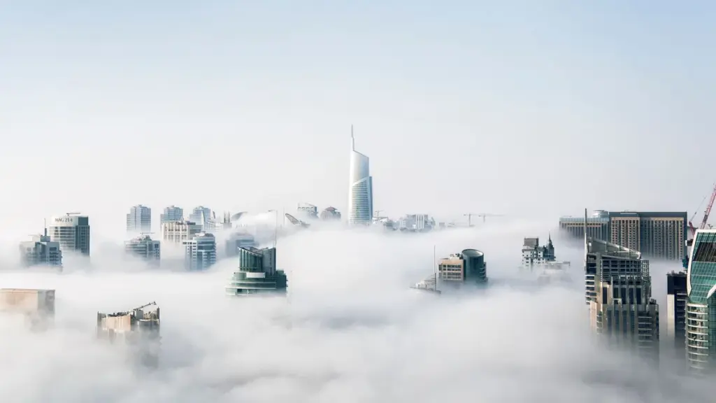Modern city office buildings representing enterprise telecommunications infrastructure.