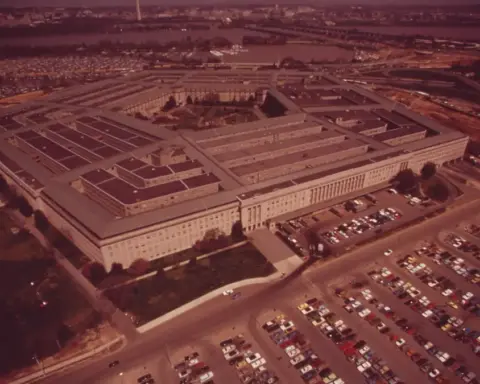 Aerial photograph of the five-sided Pentagon building complex and courtyard in Arlington, Virginia.