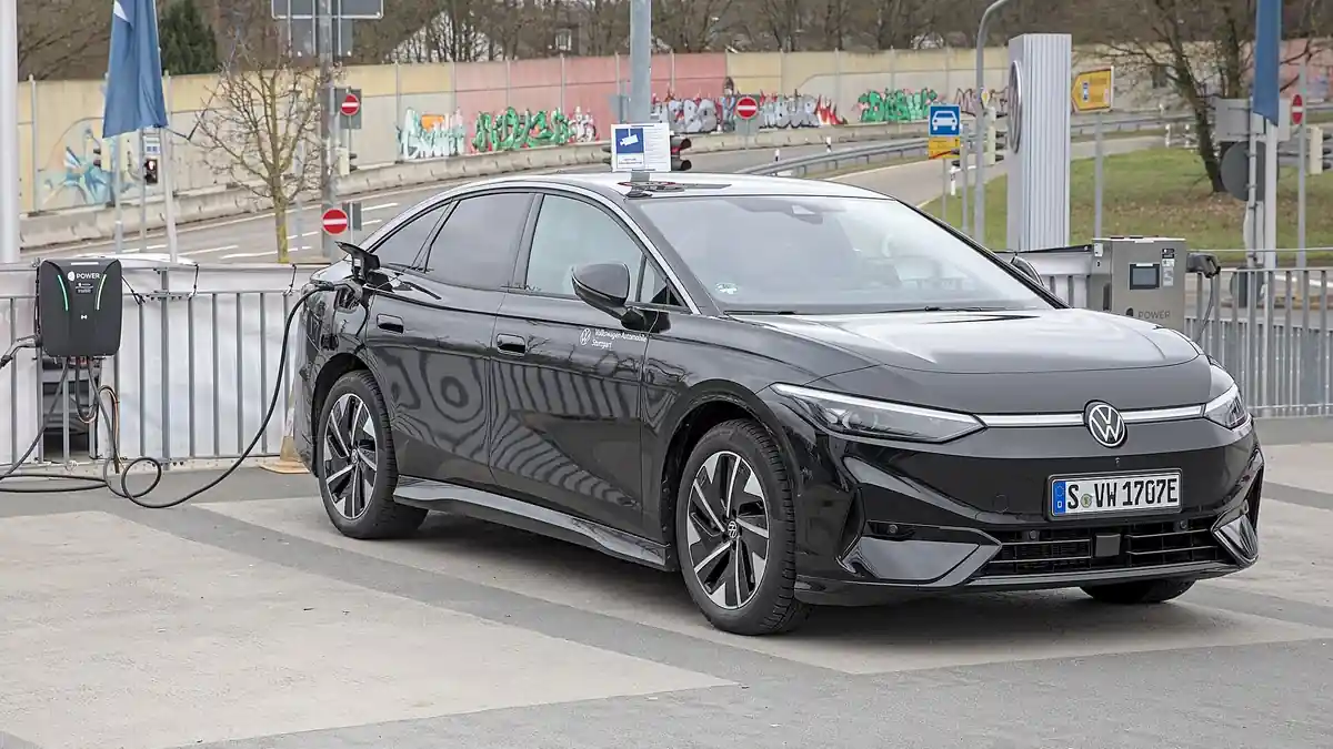 A Volkswagen ID.7 electric sedan photographed from the side.