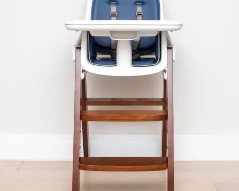 A wooden high chair with a feeding tray in a bright room.
