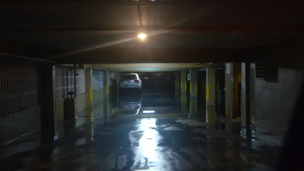 Tidal flooding in a Miami Beach garage during king tide conditions.