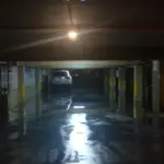 Tidal flooding in a Miami Beach garage during king tide conditions.
