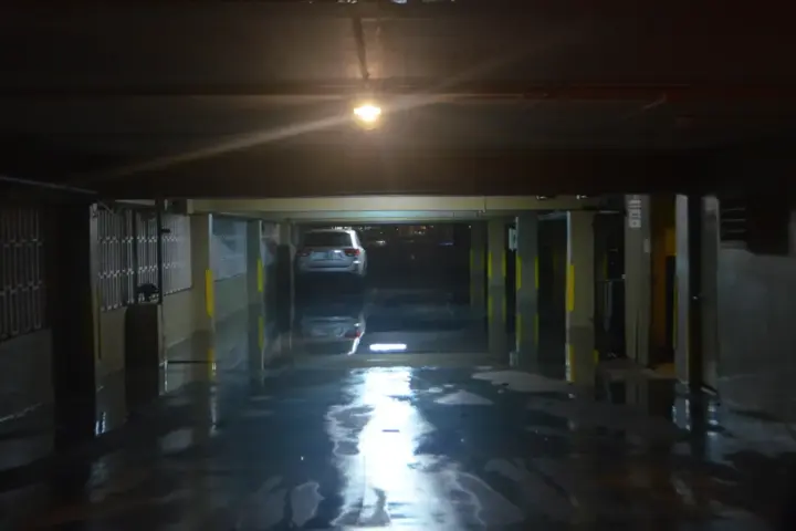 Tidal flooding in a Miami Beach garage during king tide conditions.