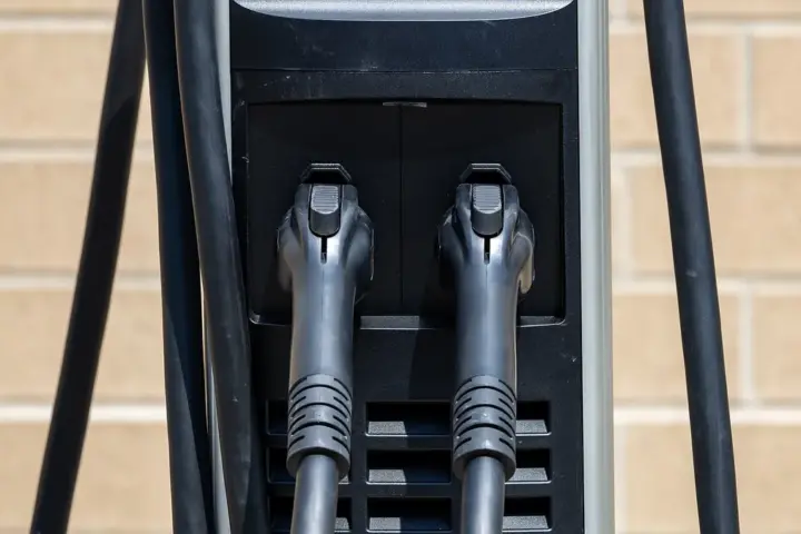 Charging connectors at a public EV charging station.
