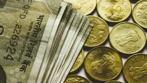 Assorted banknotes arranged near a currency exchange workspace