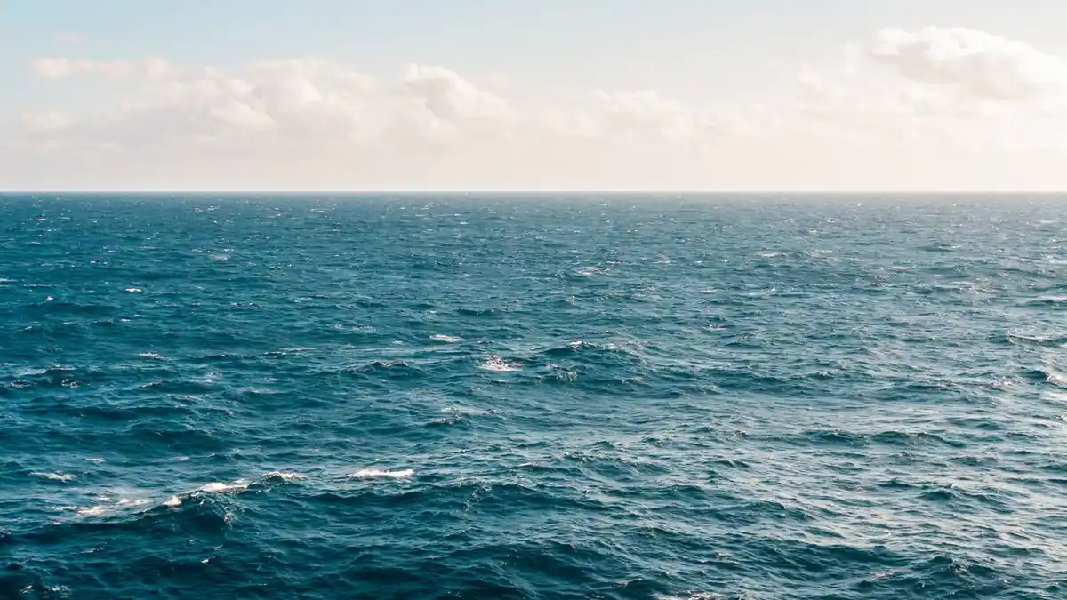 Passenger vessel travelling across open water.