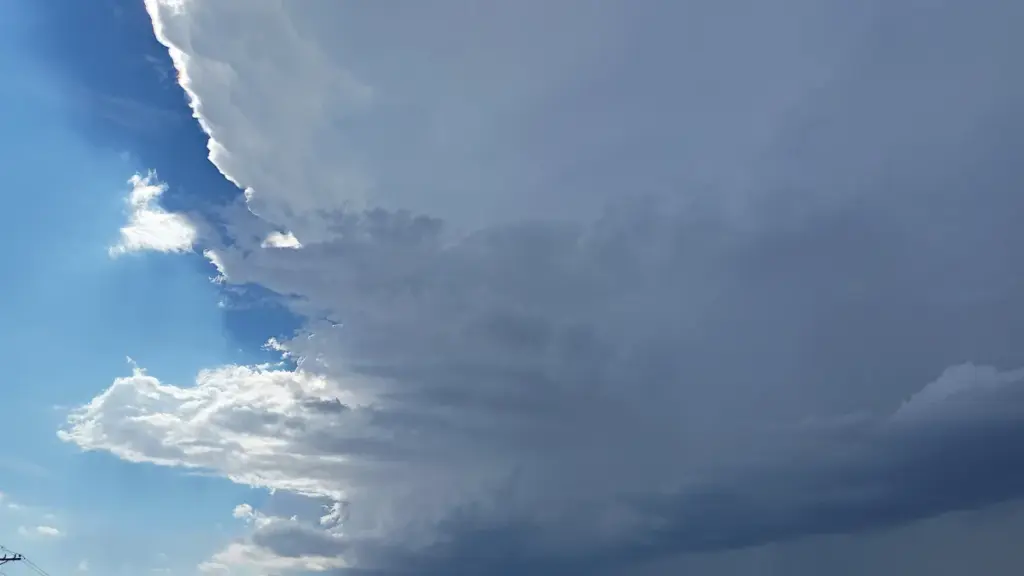 Dark supercell thunderstorm clouds building over the landscape, similar to the system that struck northern Arizona