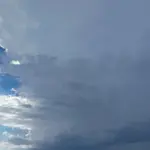Dark supercell thunderstorm clouds building over the landscape, similar to the system that struck northern Arizona
