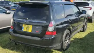 A Subaru SUV such as a Forester or Crosstrek parked outdoors