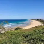 Breaking ocean waves along the Sunshine Coast sand beaches and coastal dunes.