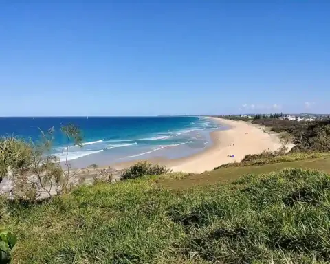 Breaking ocean waves along the Sunshine Coast sand beaches and coastal dunes.