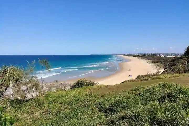 Breaking ocean waves along the Sunshine Coast sand beaches and coastal dunes.