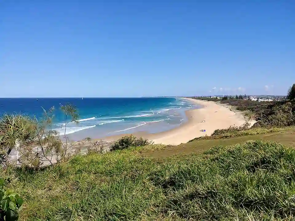 Breaking ocean waves along the Sunshine Coast sand beaches and coastal dunes.
