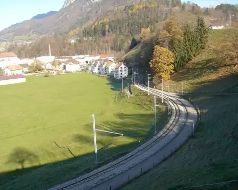 Railway tracks in Switzerland, illustrating the setting for a removable solar-panel pilot