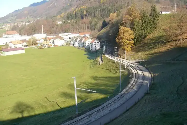 Railway tracks in Switzerland, illustrating the setting for a removable solar-panel pilot
