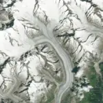 Before and after satellite images showing glacial ice loss in the Swiss Alps