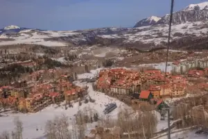 Snow-covered runs and buildings at Telluride Ski Resort in Colorado.