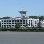 The U.S. Naval Research Laboratory in Washington D.C., a modern research facility with satellite dish and river access.