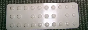 Close-up of levothyroxine thyroid medication tablets in a blister pack, representing the recalled lot 504950 superpotency concern.