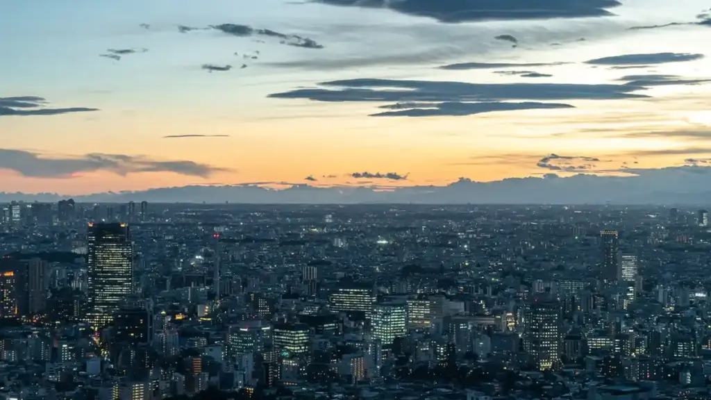 Tokyo skyline at dusk with illuminated skyscrapers