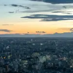 Tokyo skyline at dusk with illuminated skyscrapers
