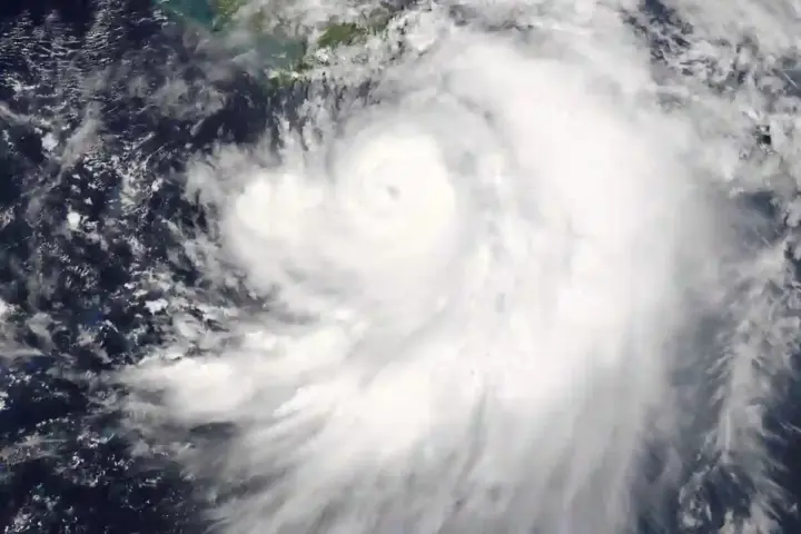 Satellite view of a tropical storm system over the ocean.