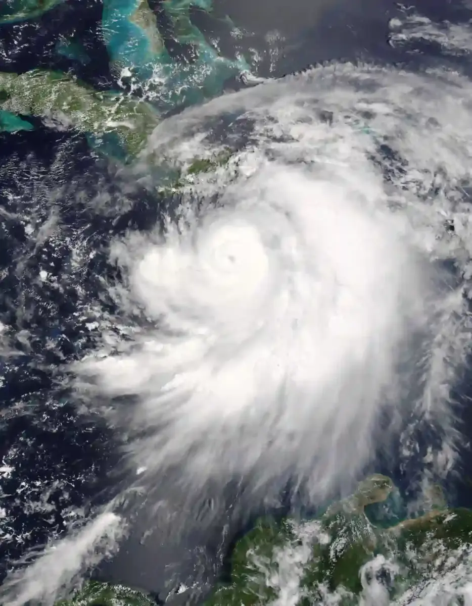 Satellite view of a tropical storm system over the ocean.