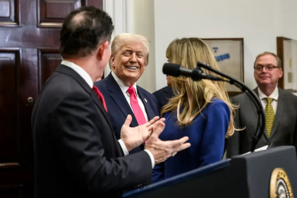 President Donald Trump and Michael Dell with officials during a Trump Accounts announcement at the White House.