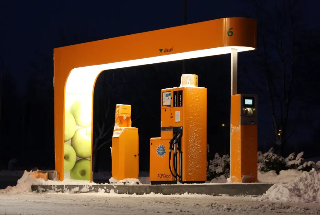 A heavy-duty automated diesel fuel pump nozzle at a filling station.