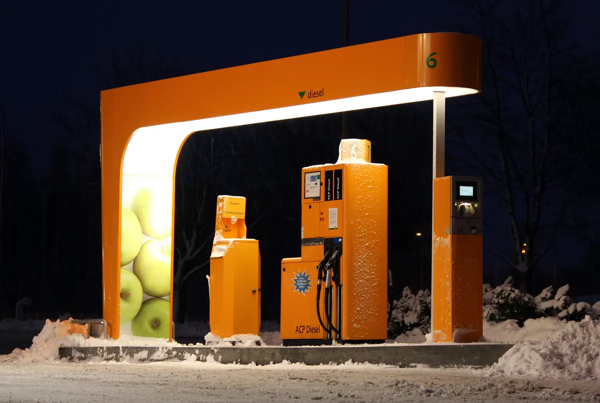 A heavy-duty automated diesel fuel pump nozzle at a filling station.