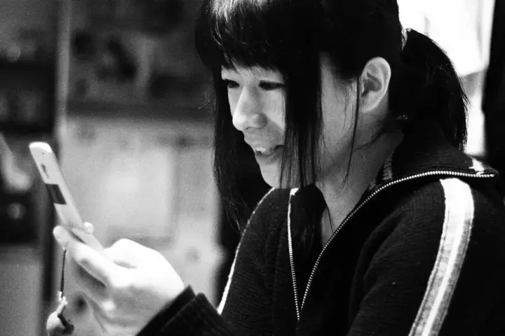 A Japanese woman with a mobile phone.jpg