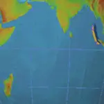 A massive tsunami wave approaching a tropical coastline after an undersea earthquake triggers a sea-level rise