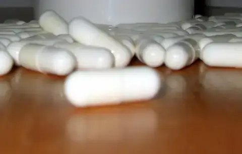 White capsules arranged on a tabletop, a representative image for a prescription thyroid medication recall notice.