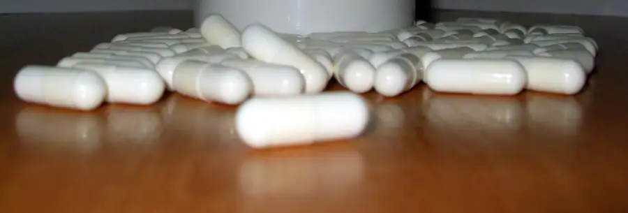 White capsules arranged on a tabletop, a representative image for a prescription thyroid medication recall notice.